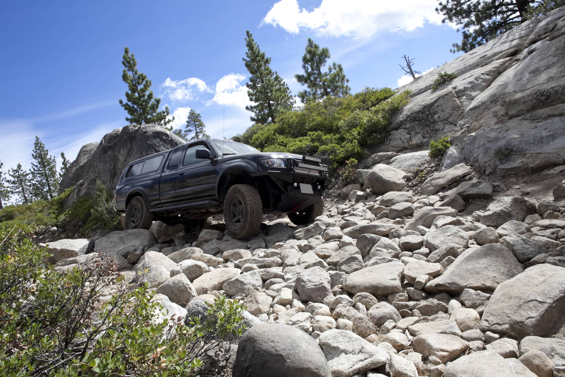 Truck in mountain on rocks